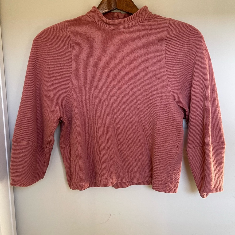 Lovely back buttons and quarter lengthy sleeves. Great for work or brunch!